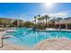 Expansive pool area with steps and lounge chairs at 2809 Almaton Loop # 304, Kissimmee, FL 34747