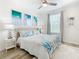 Serene bedroom with beach decor and ensuite bathroom access at 2809 Almaton Loop # 304, Kissimmee, FL 34747