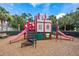 Modern playground with slides, climbing structures, and plenty of play space for children at 2809 Almaton Loop # 304, Kissimmee, FL 34747