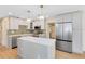 Modern kitchen with stainless steel appliances and an island at 2445 Sanford Ave, Sanford, FL 32771