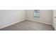 Bright bedroom with window and neutral walls at 279 Fig Ct, Poinciana, FL 34759