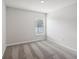 Simple bedroom with carpeted floor and window at 279 Fig Ct, Poinciana, FL 34759