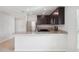 Modern kitchen with stainless steel appliances and granite countertops at 279 Fig Ct, Poinciana, FL 34759