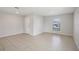 Spacious living room with tile flooring and lots of natural light at 279 Fig Ct, Poinciana, FL 34759
