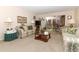 Spacious living room with a sofa, coffee table, and view of backyard at 280 Windmeadows St, Altamonte Springs, FL 32701