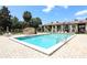 Relaxing community pool with surrounding patio furniture at 280 Windmeadows St, Altamonte Springs, FL 32701