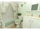 Bathroom with bathtub, toilet and white vanity at 280 Windmeadows St, Altamonte Springs, FL 32701