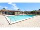 Community pool with patio furniture at 280 Windmeadows St, Altamonte Springs, FL 32701