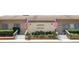 Community clubhouse with flag and landscaping at 280 Windmeadows St, Altamonte Springs, FL 32701