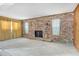 Spacious living room with hardwood floors and brick fireplace at 447-441 N Lincoln St, Daytona Beach, FL 32114