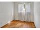 Bright bedroom with hardwood floors and white walls at 447-441 N Lincoln St, Daytona Beach, FL 32114
