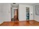 Bedroom with hardwood floors, access to bathroom at 447-441 N Lincoln St, Daytona Beach, FL 32114
