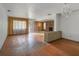Bright living room with hardwood floors and a brick fireplace at 447-441 N Lincoln St, Daytona Beach, FL 32114