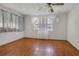 Bedroom with hardwood floors and window with curtains at 447-441 N Lincoln St, Daytona Beach, FL 32114