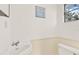 Simple bathroom with pedestal sink and classic toilet at 504 Osceola Ave, Eustis, FL 32726