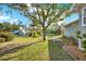 Large backyard with spacious grassy area at 504 Osceola Ave, Eustis, FL 32726