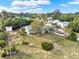 Aerial view of a single Gathering home with a large yard at 504 Osceola Ave, Eustis, FL 32726
