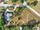Aerial view of a vacant lot in a residential neighborhood at 504 Osceola Ave, Eustis, FL 32726