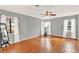 Spacious bedroom with hardwood floors and ample natural light at 504 Osceola Ave, Eustis, FL 32726