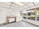 Laundry room with washer, dryer, and ample storage at 504 Osceola Ave, Eustis, FL 32726