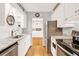 Modern kitchen featuring stainless steel appliances and granite countertops at 504 Osceola Ave, Eustis, FL 32726