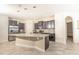 Modern kitchen with stainless steel appliances and an island at 1511 Alligator St, St Cloud, FL 34771