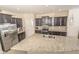 Modern kitchen with granite countertops and stainless steel appliances at 1511 Alligator St, St Cloud, FL 34771
