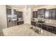 Modern kitchen featuring stainless steel appliances and granite countertops at 1511 Alligator St, St Cloud, FL 34771