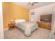 Cozy bedroom with double bed, nightstand, and dresser at 1511 Alligator St, Saint Cloud, FL 34771