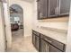 Kitchen features granite countertops and dark cabinets at 1511 Alligator St, St Cloud, FL 34771