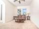 Living room with a comfy couch and large windows at 1511 Alligator St, St Cloud, FL 34771