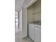 Convenient laundry room with washer and dryer at 3825 Quaint Ln # F, Clermont, FL 34711
