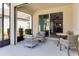 Enjoyable screened patio with seating area and access to interior at 3825 Quaint Ln # F, Clermont, FL 34711