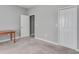 Light and airy bedroom with carpeted floor, neutral walls and closet at 3825 Quaint Ln # F, Clermont, FL 34711