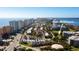 Aerial view of townhouses near the ocean and a par 3 golf course at 107 Oceans Cir, Daytona Beach Shores, FL 32118