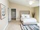 Spacious bedroom with plush carpet and large walk-in closet at 107 Oceans Cir, Daytona Beach Shores, FL 32118