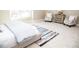 Serene bedroom with a cozy rug and plenty of space at 107 Oceans Cir, Daytona Beach Shores, FL 32118