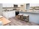 Modern kitchen with stainless steel appliances and granite countertops at 107 Oceans Cir, Daytona Beach Shores, FL 32118