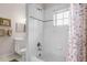 Bathroom with shower/tub combo and a patterned shower curtain at 101 New Providence # 9101, Davenport, FL 33897