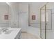 Bathroom features a corner soaking tub and walk-in shower at 101 New Providence # 9101, Davenport, FL 33897