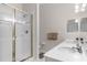 Bathroom with double vanity, shower, and separate tub at 101 New Providence # 9101, Davenport, FL 33897