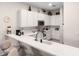 Modern kitchen with white cabinets and breakfast bar at 101 New Providence # 9101, Davenport, FL 33897