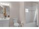 Bathroom with a tub, toilet and vanity at 101 New Providence # 9101, Davenport, FL 33897