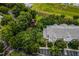 Aerial view showing building and playground in a tree-filled community at 101 New Providence # 9101, Davenport, FL 33897
