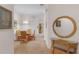 Dining room with wicker dining set and carpet flooring at 101 New Providence # 9101, Davenport, FL 33897