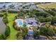 Community pool and surrounding area with landscaping at 101 New Providence # 9101, Davenport, FL 33897