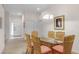Dining area near entryway with glass table and chairs at 101 New Providence # 9101, Davenport, FL 33897