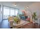 Bright living room with city views and stylish decor at 150 E Robinson St # 3106, Orlando, FL 32801