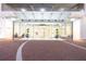 Modern building entrance with glass doors and seating at 150 E Robinson St # 3106, Orlando, FL 32801