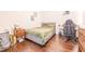 Bedroom with wood floors and workspace at 150 E Robinson St # 3106, Orlando, FL 32801